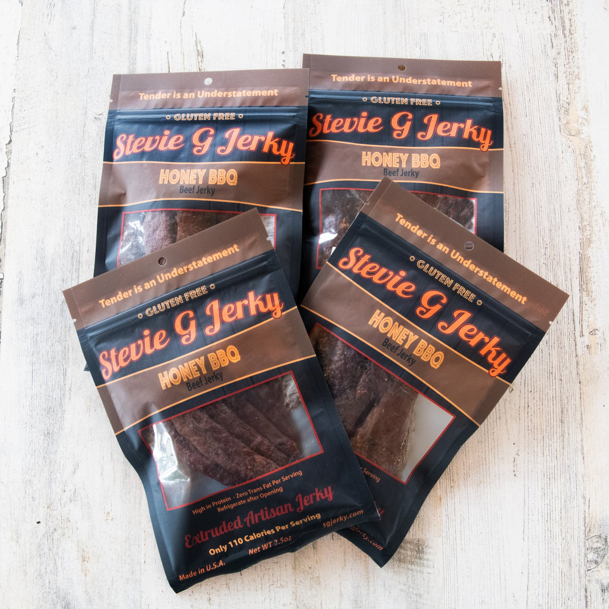 Four bags of Stevie G Honey BBQ beef jerky
