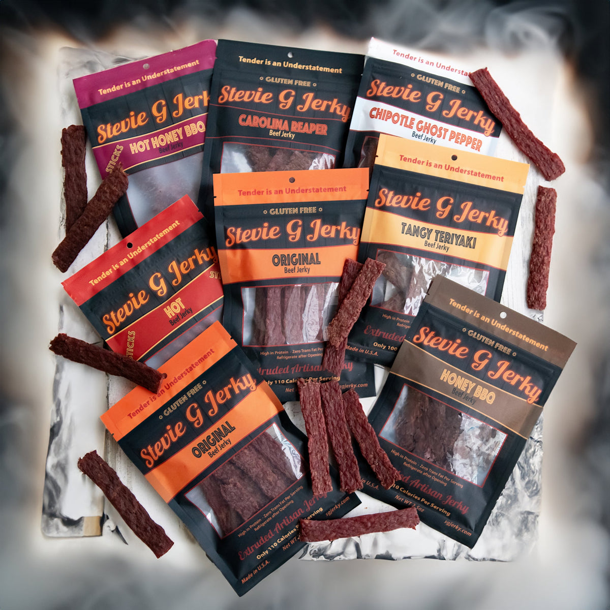 Bulk assortment of Stevie G beef jerky bags and flats