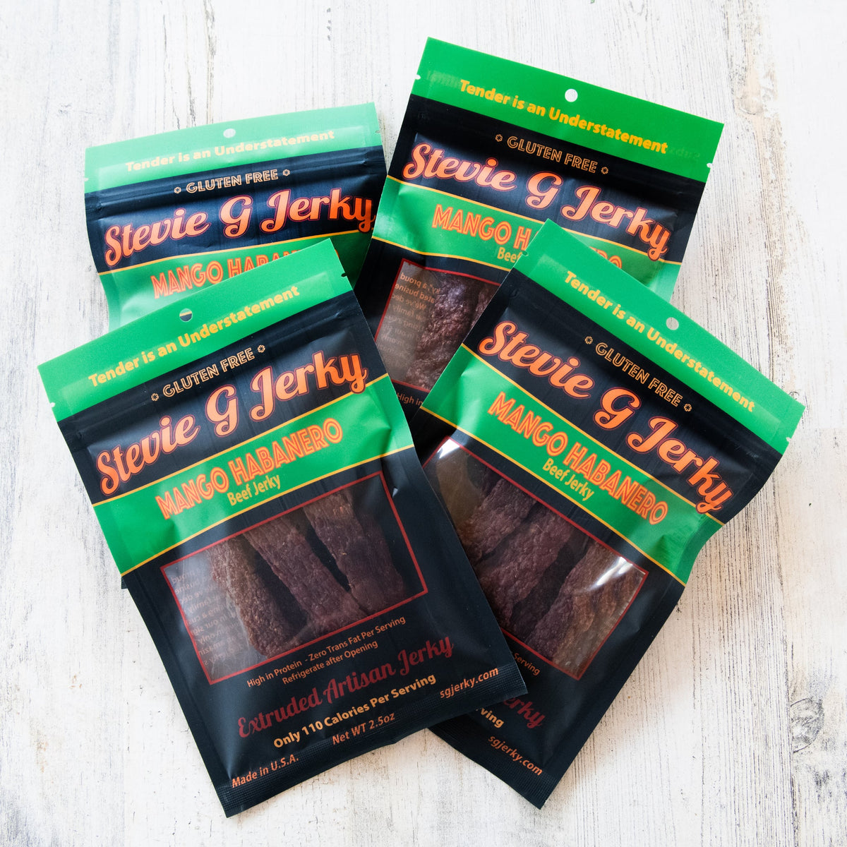 Four bags of Stevie G Mango Habanero beef jerky