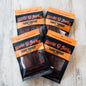 Four bags of Stevie G Teriyaki beef jerky