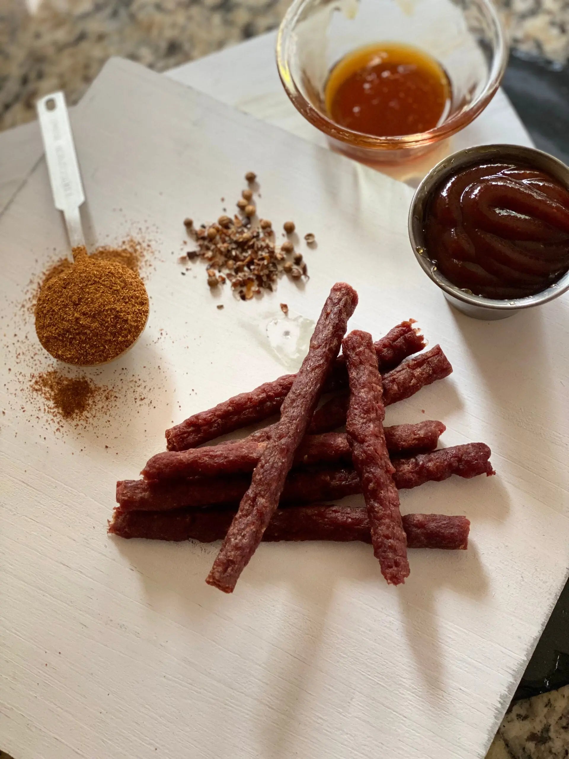 Hot-Honey BBQ Beef Jerky Sticks with a hint of cayenne pepper