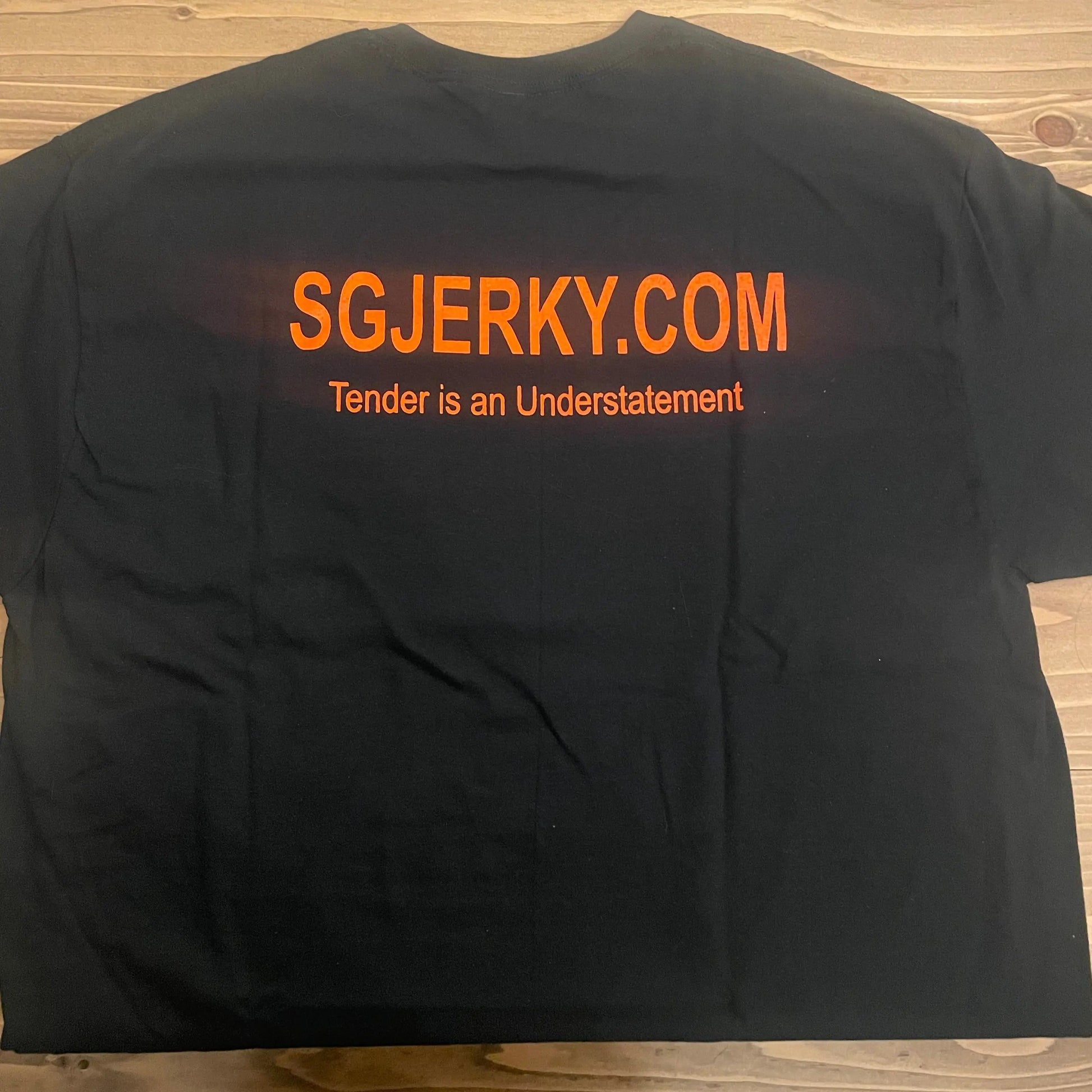 Stevie G Jerky T-Shirt featuring an orange logo
